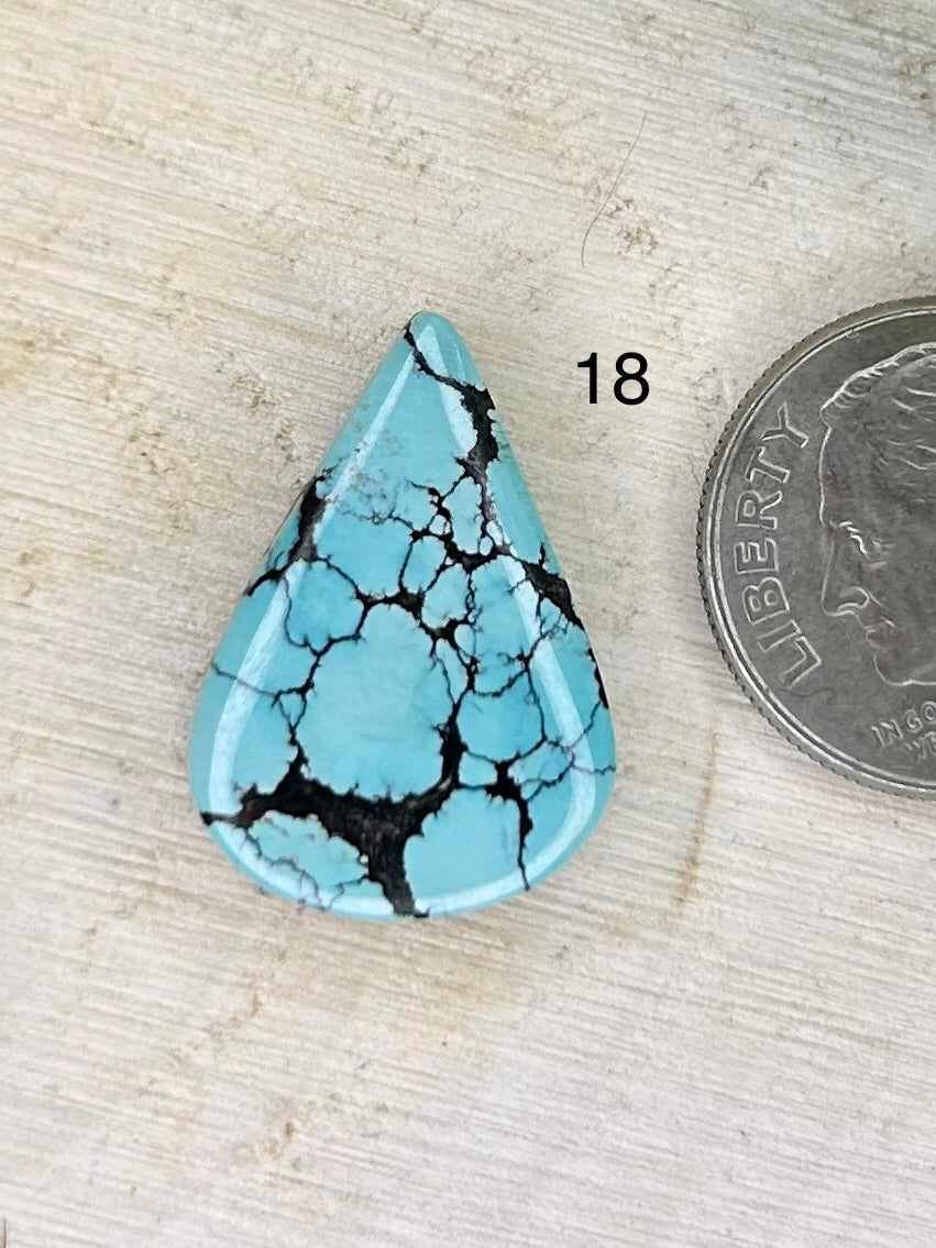Kingman webbed turquoise cabochon